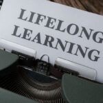 Continuous Improvement - A typewriter with the word long life learning on it