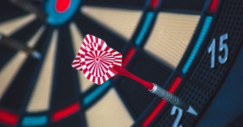 Goal Setting - Red and White Dart on Darts Board